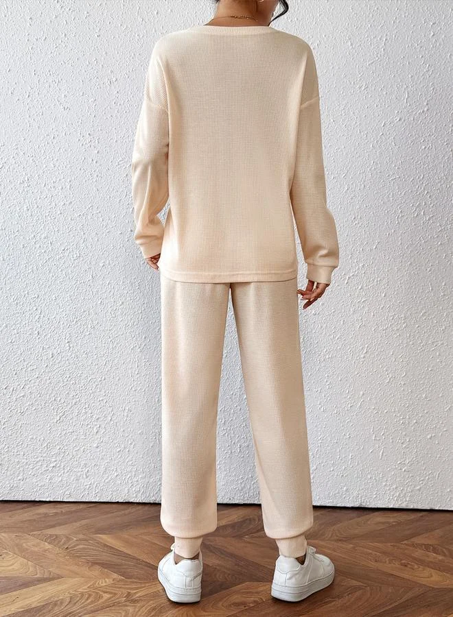 تايك تو طقم بلوزة محبوك وافل وبنطال بيج للنساء